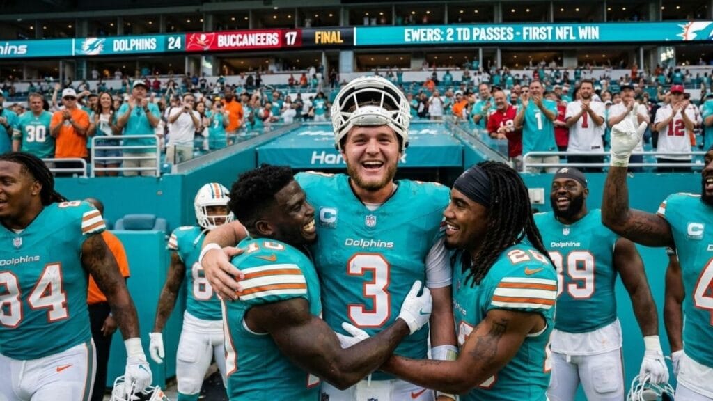 Miami Dolphins Rookie Quarterback Quinn Ewers (center) Celebrates With Teammates After Throwing Two Touchdowns To Secure His First Nfl Victory Against The Tampa Bay Buccaneers