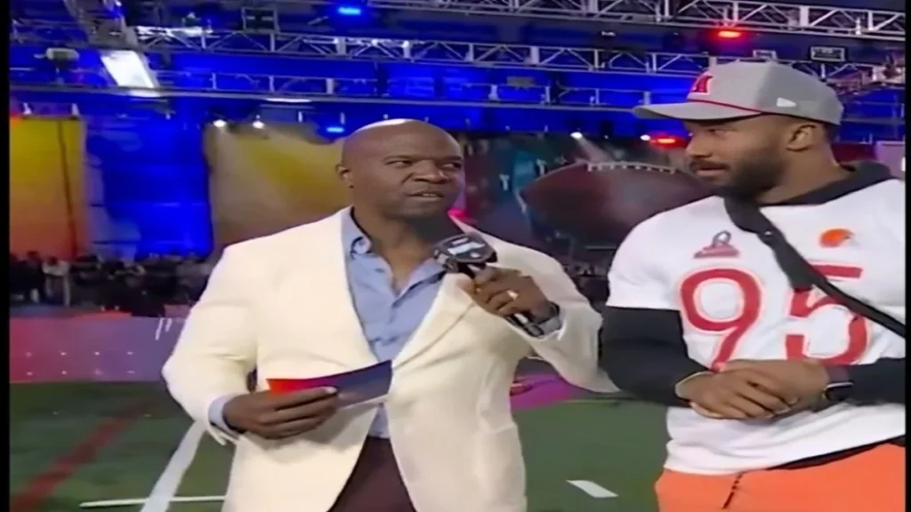 myles garrett (right) proves he's the smartest man in the league alongside host terry crews (left) in this viral throwback clip shared by the browns.